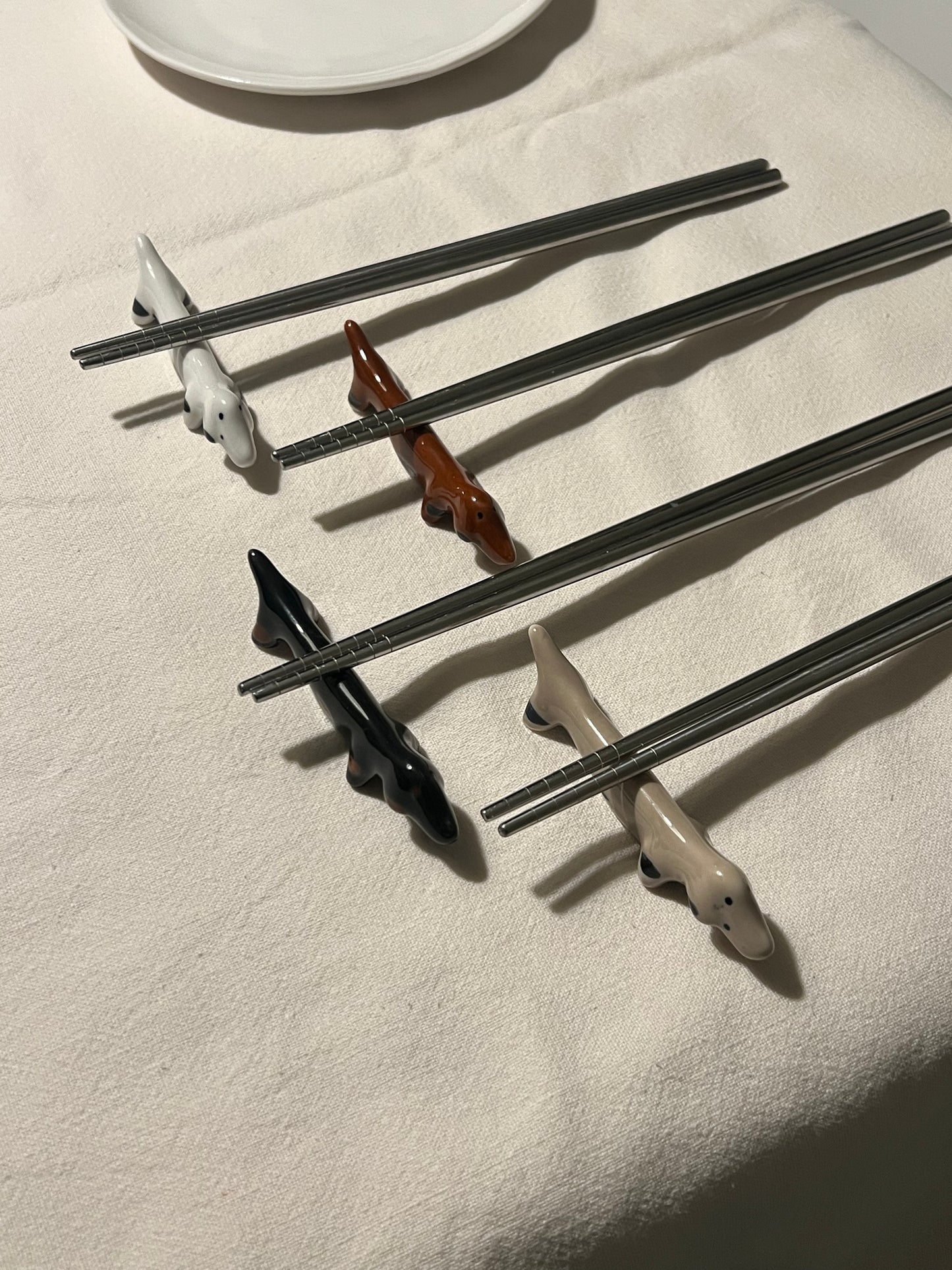 PERRITOS APOYA PALITOS X4