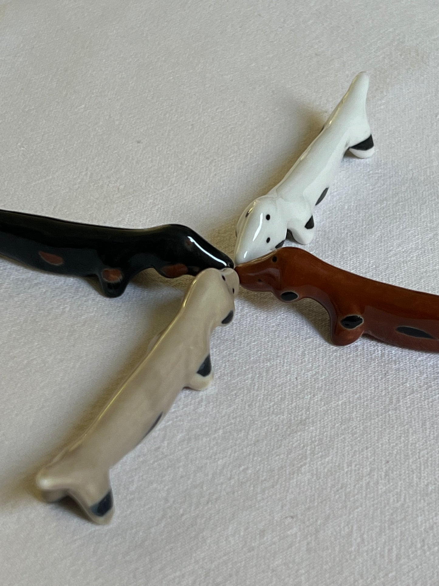 PERRITOS APOYA PALITOS X4